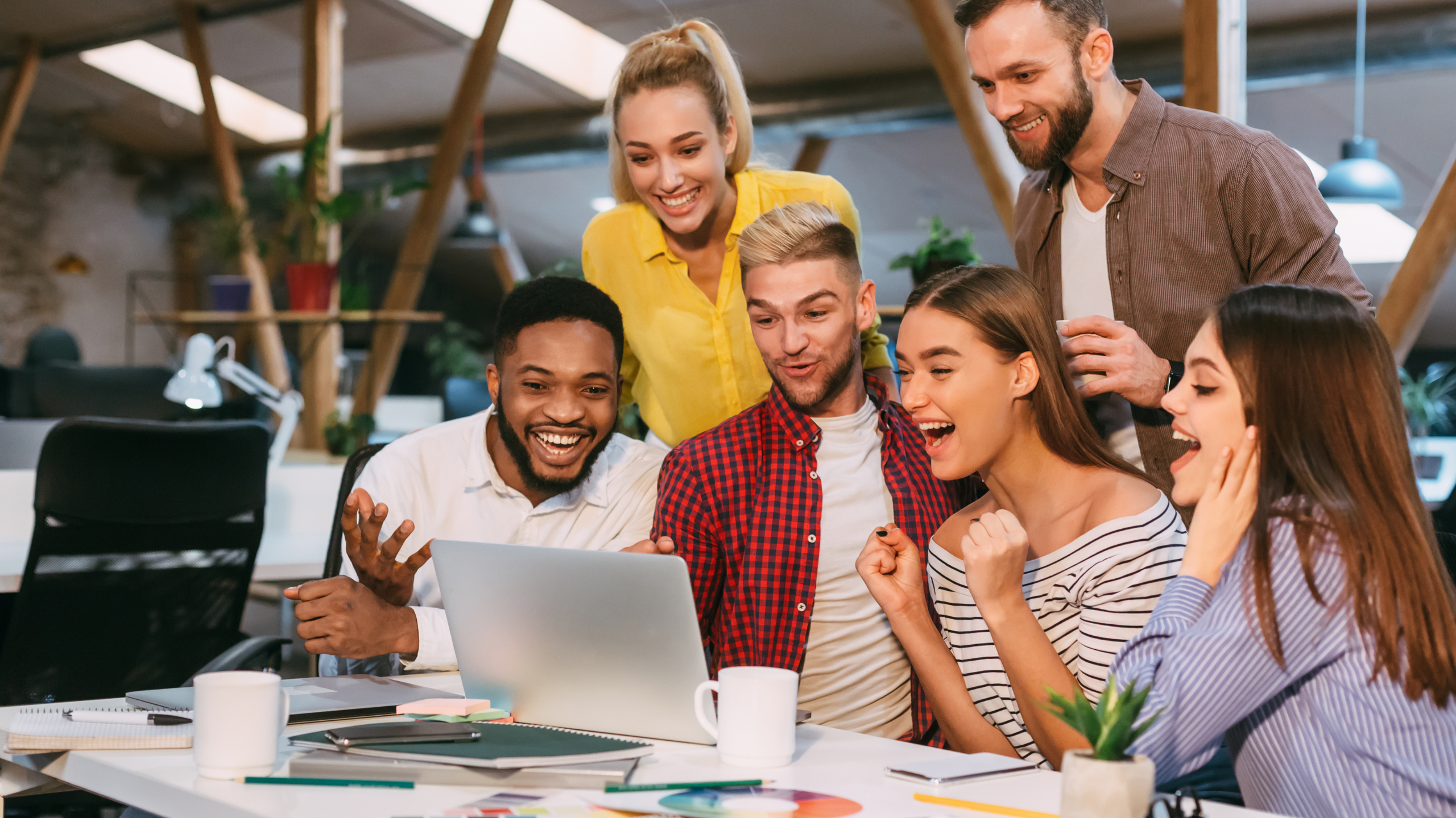 A team celebrating a campaign go-live.